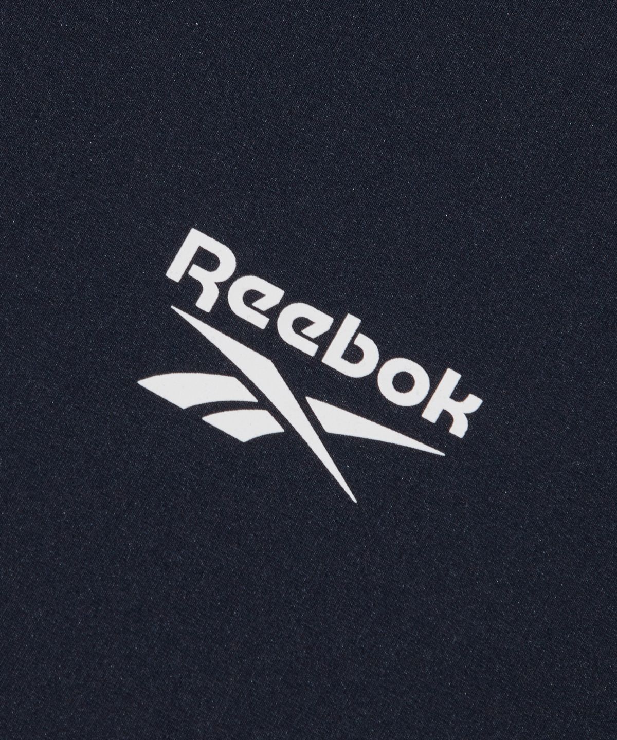 리복(REEBOK) 스웰 그래픽 래쉬가드 겸용 반팔티 - 블랙