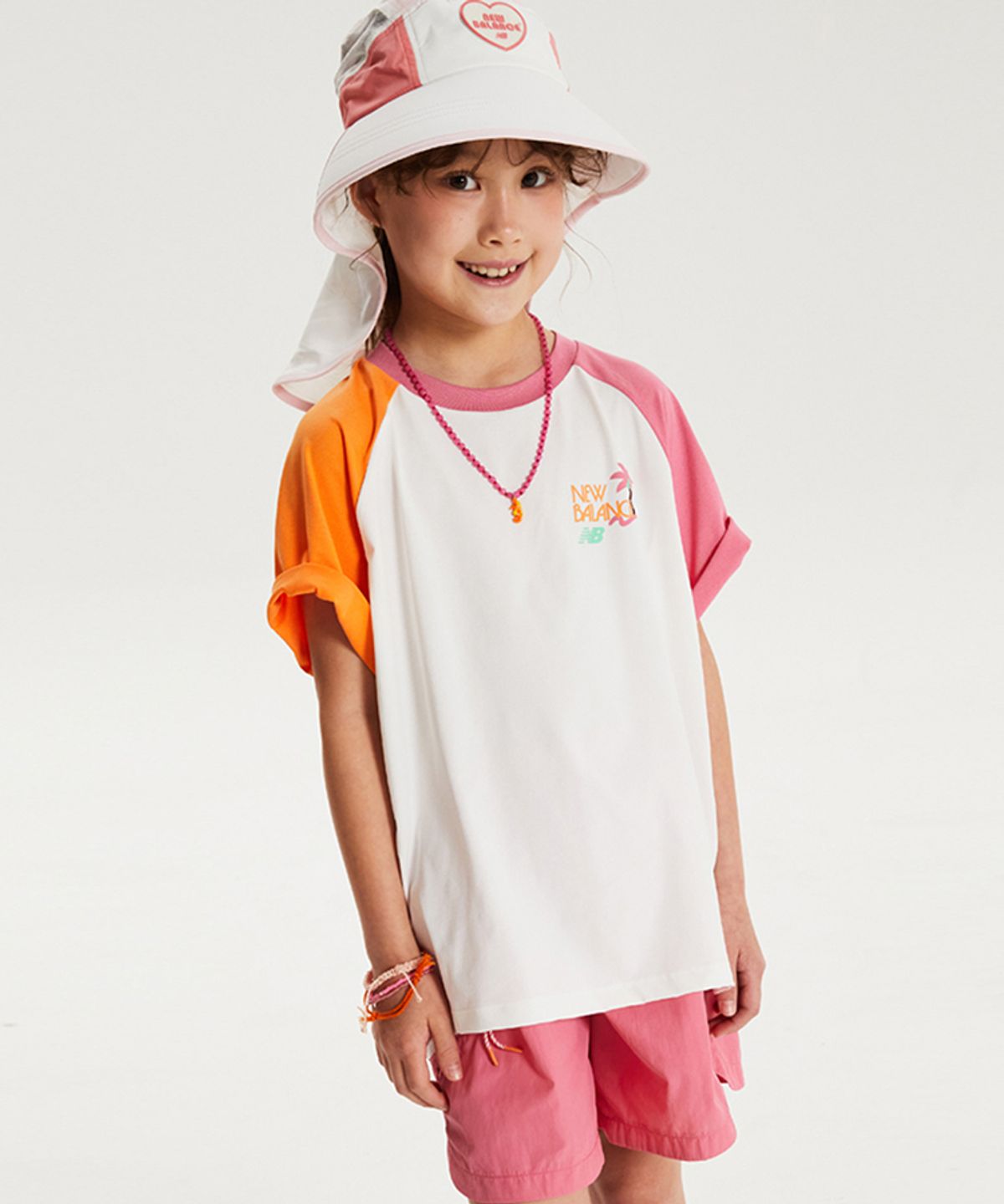 뉴발란스 키즈(NEWBALANCEKIDS) SUMMER WAVE_컬러블럭 라글란 반팔 셋업 아동 상하복 NK9YG3973U25