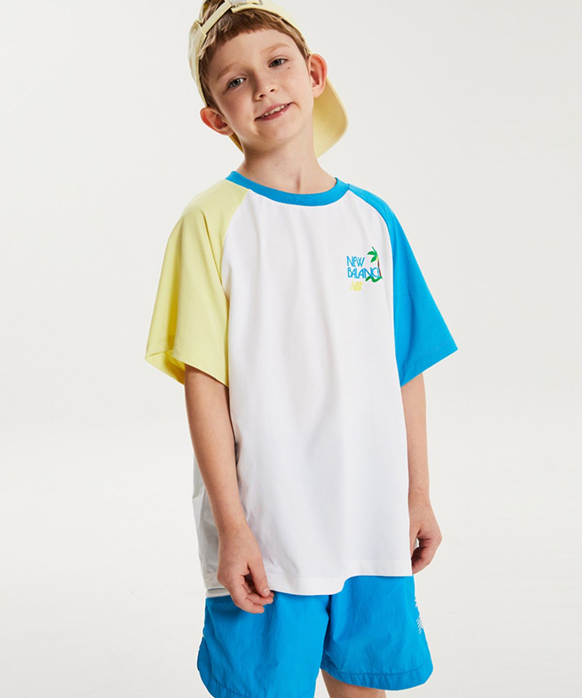 뉴발란스 키즈(NEWBALANCEKIDS) SUMMER WAVE_컬러블럭 라글란 반팔 셋업 아동 상하복 NK9YG3973U50