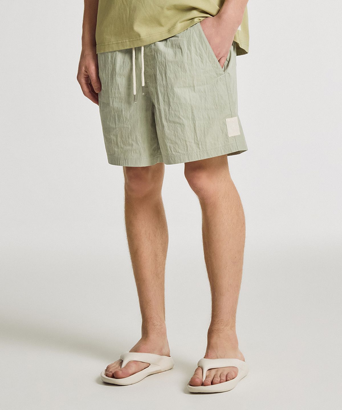 뉴발란스(NEW BALANCE) NBNVGCA013 / UNI 썬키스트 4.5부 쇼츠 (L/KHAKI)