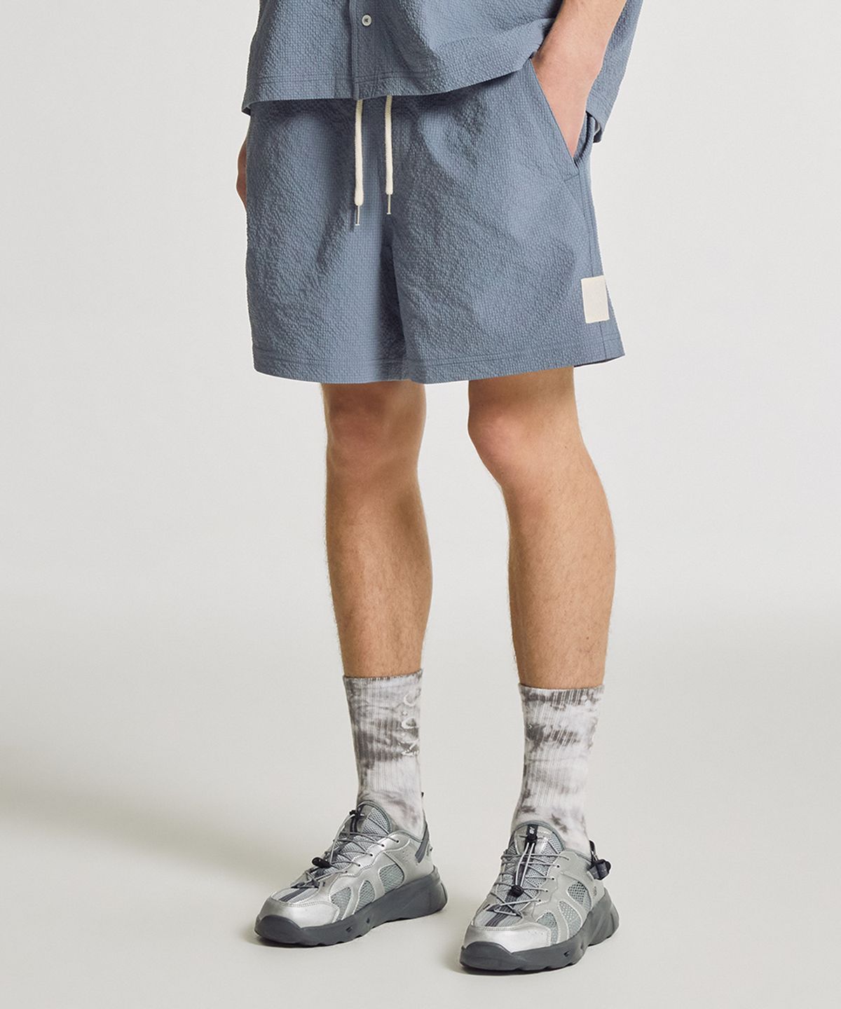 뉴발란스(NEW BALANCE) NBNVGCA013 / UNI 썬키스트 4.5부 쇼츠 (INDIGO)