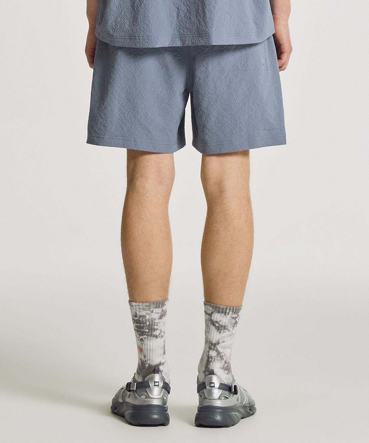 뉴발란스(NEW BALANCE) NBNVGCA013 / UNI 썬키스트 4.5부 쇼츠 (INDIGO)