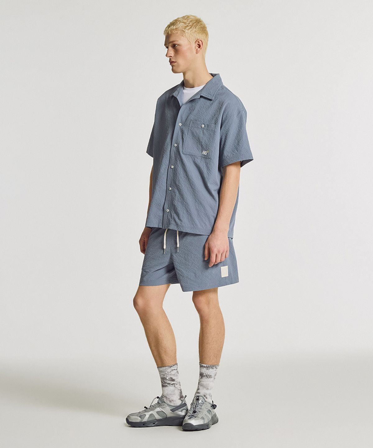 뉴발란스(NEW BALANCE) NBNVGCA013 / UNI 썬키스트 4.5부 쇼츠 (INDIGO)