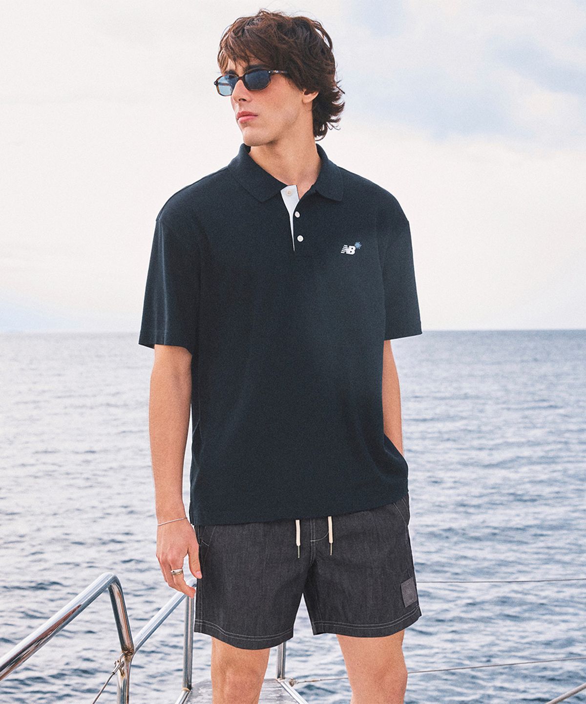 뉴발란스(NEW BALANCE) NBNFGCA013 / UNI 선 키스드 폴로 반팔티 (BLACK)