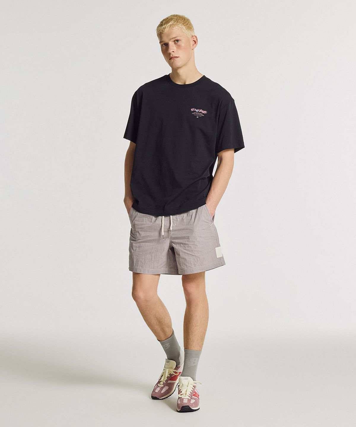 뉴발란스(NEW BALANCE) NBNEGCA023 / UNI 선 키스드 카프리 반팔티 (BLACK)