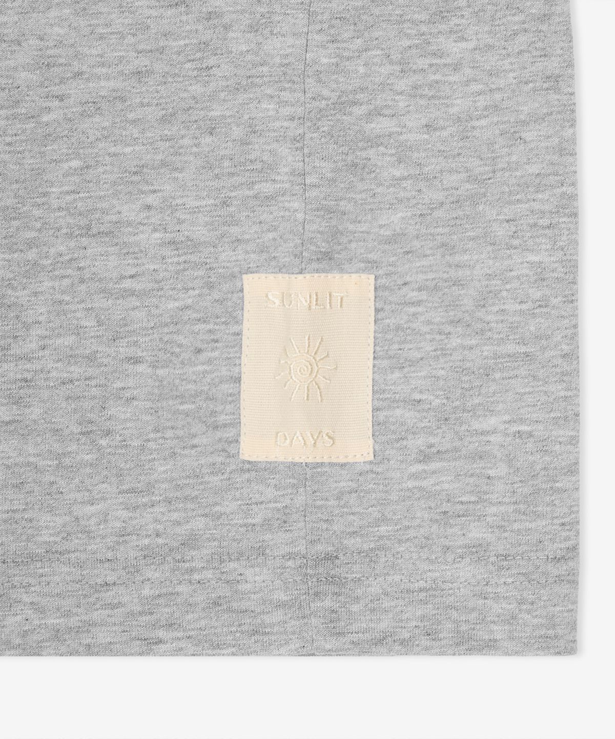 뉴발란스(NEW BALANCE) NBNEGCA023 / UNI 선 키스드 카프리 반팔티 (M/GRAY)