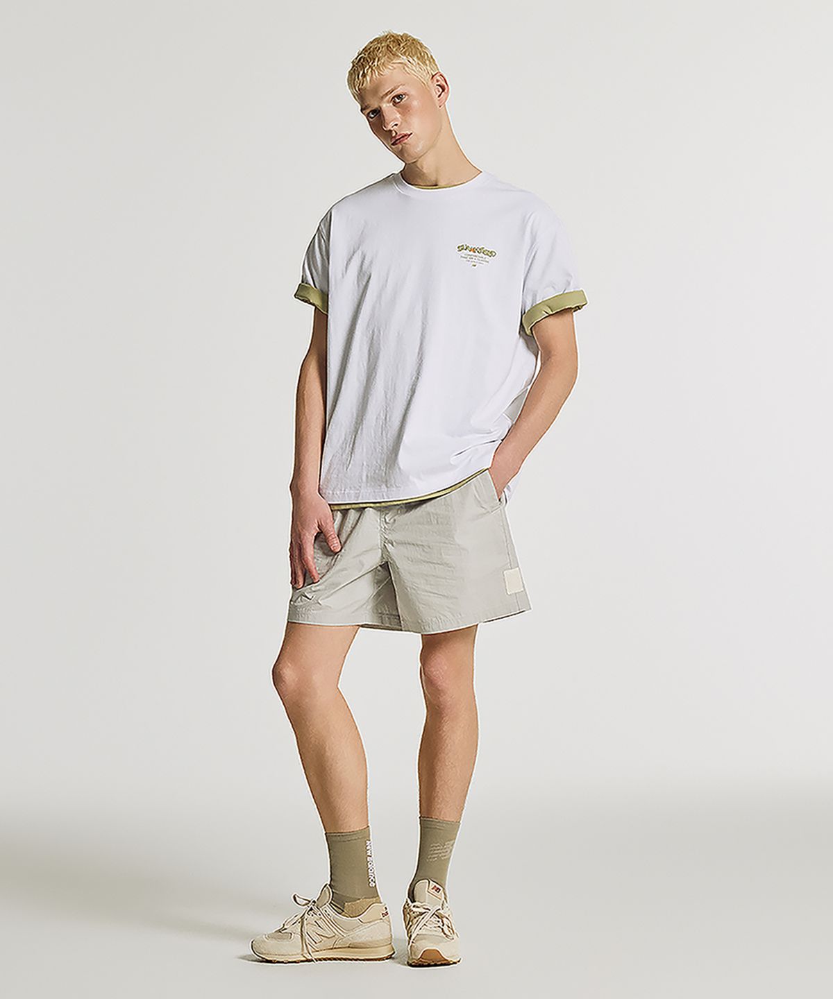 뉴발란스(NEW BALANCE) NBNEGCA023 / UNI 선 키스드 카프리 반팔티 (WHITE)