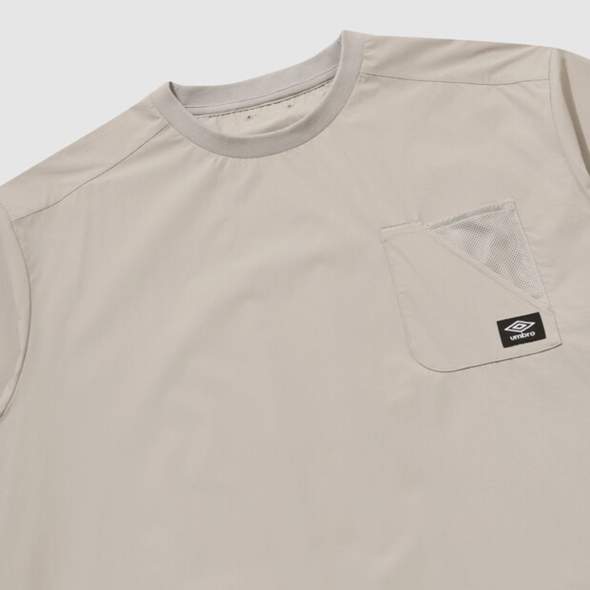 엄브로(UMBRO) [COOLING] 칠아웃 반팔 피스테 베이지 UR223CWT62