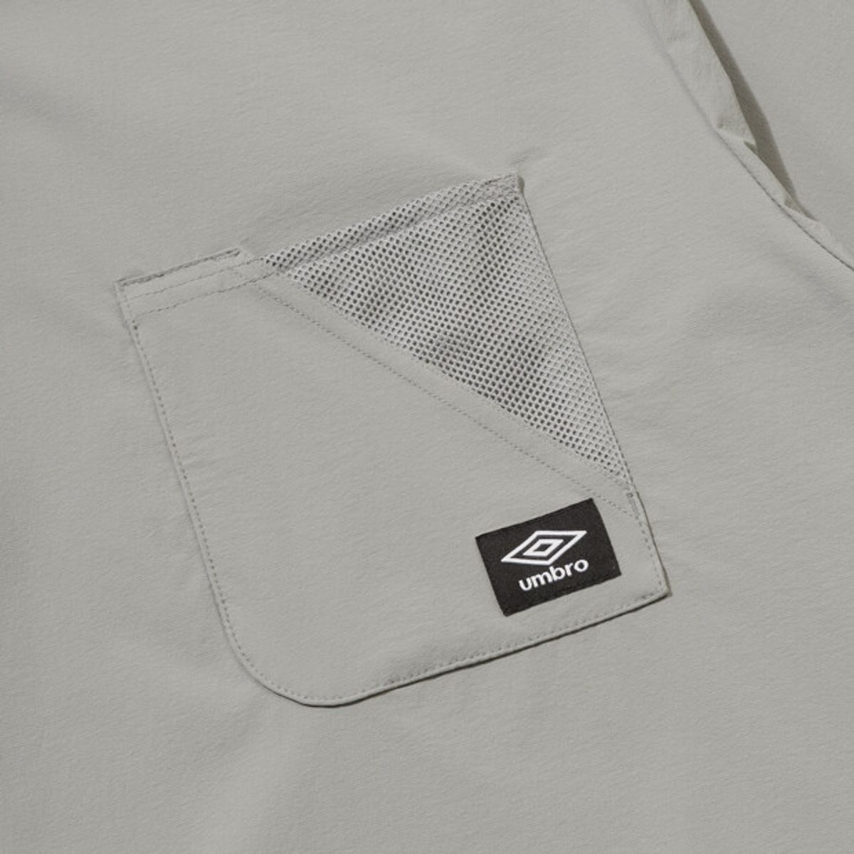 엄브로(UMBRO) [COOLING] 칠아웃 반팔 피스테 그레이 UR223CWT62