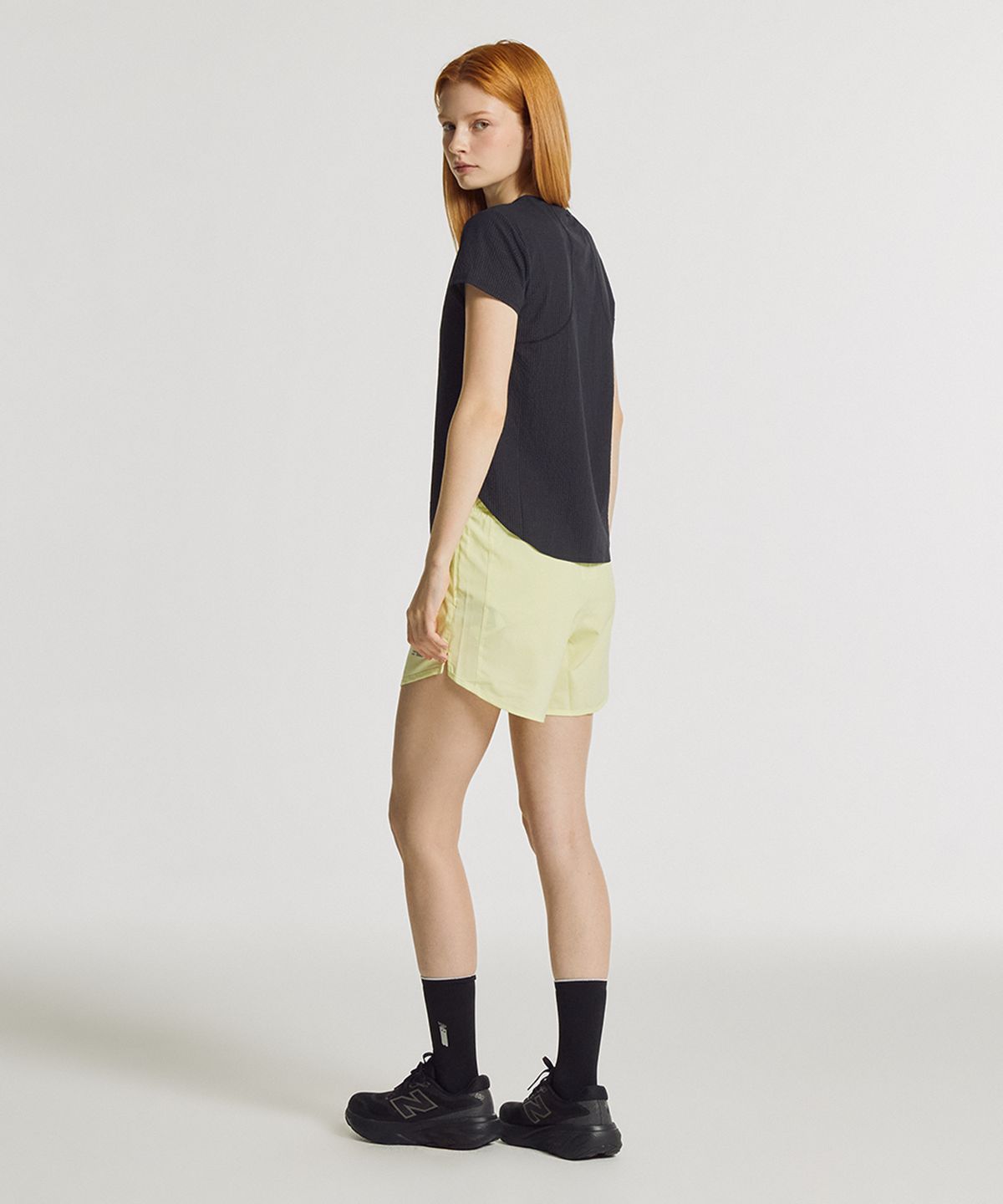 뉴발란스(NEW BALANCE) NBNVG36102 / WOMEN 스포츠에센셜 쇼츠 5인치 (LIGHT YELLOW)