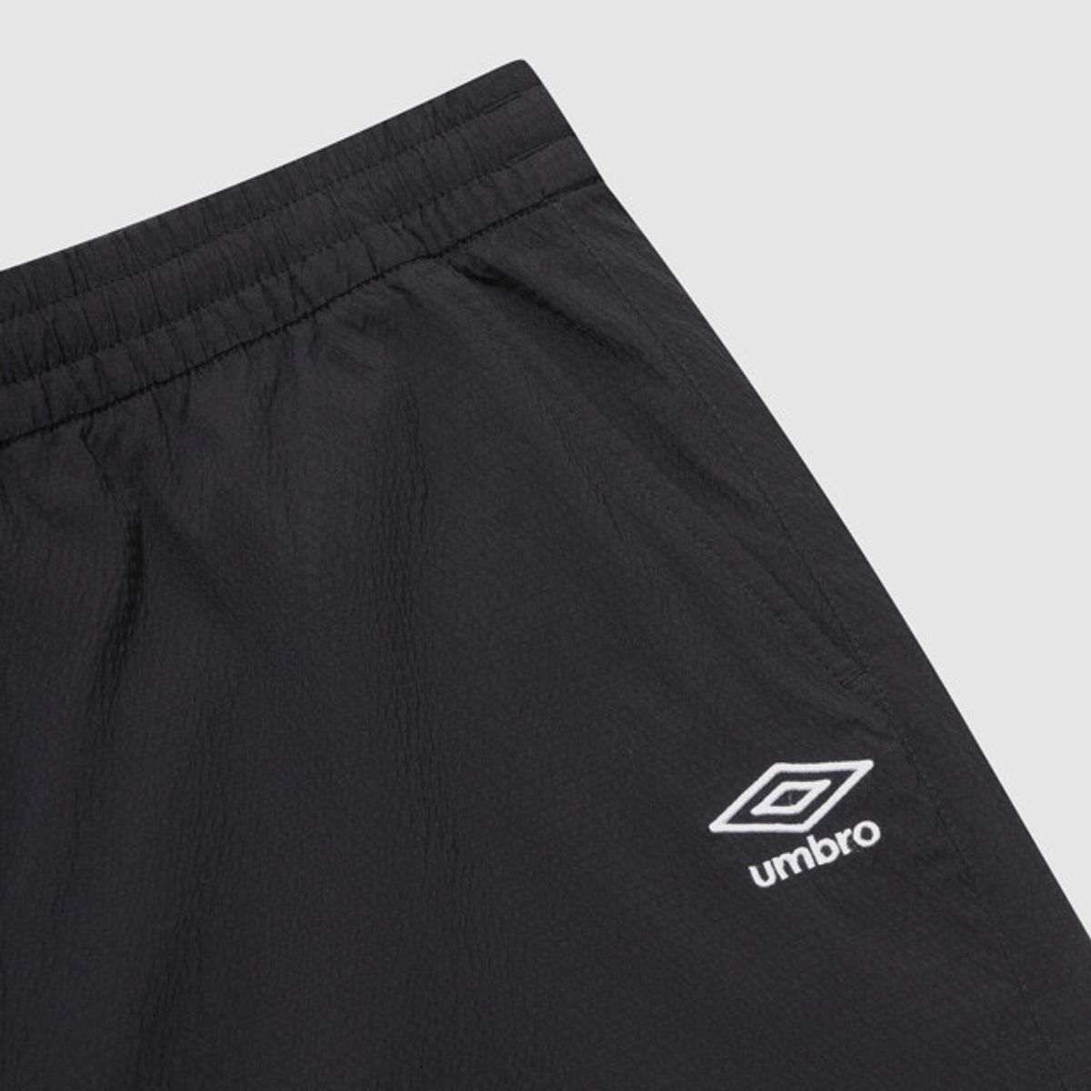 엄브로(UMBRO) 시어서커 4.5부 반바지 블랙 UR223CHP63
