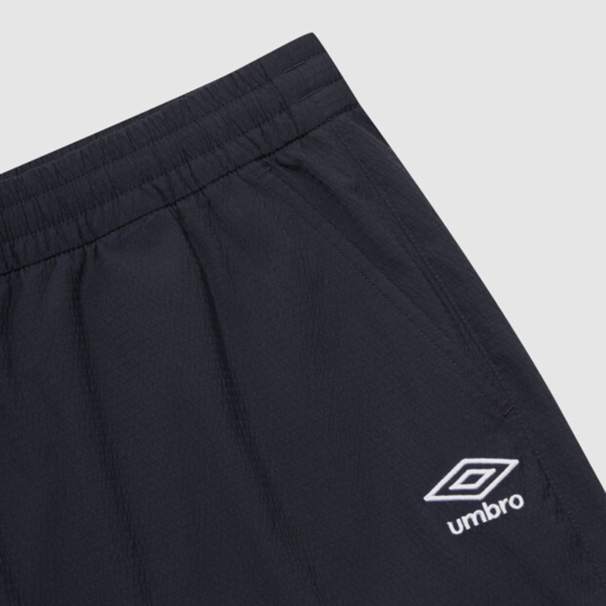 엄브로(UMBRO) 시어서커 4.5부 반바지 네이비 UR223CHP63