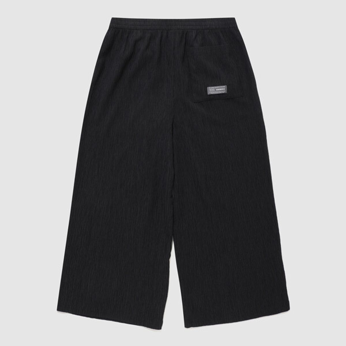 엄브로(UMBRO) 플리츠 와이드 9부 팬츠 블랙 UR221CPT63