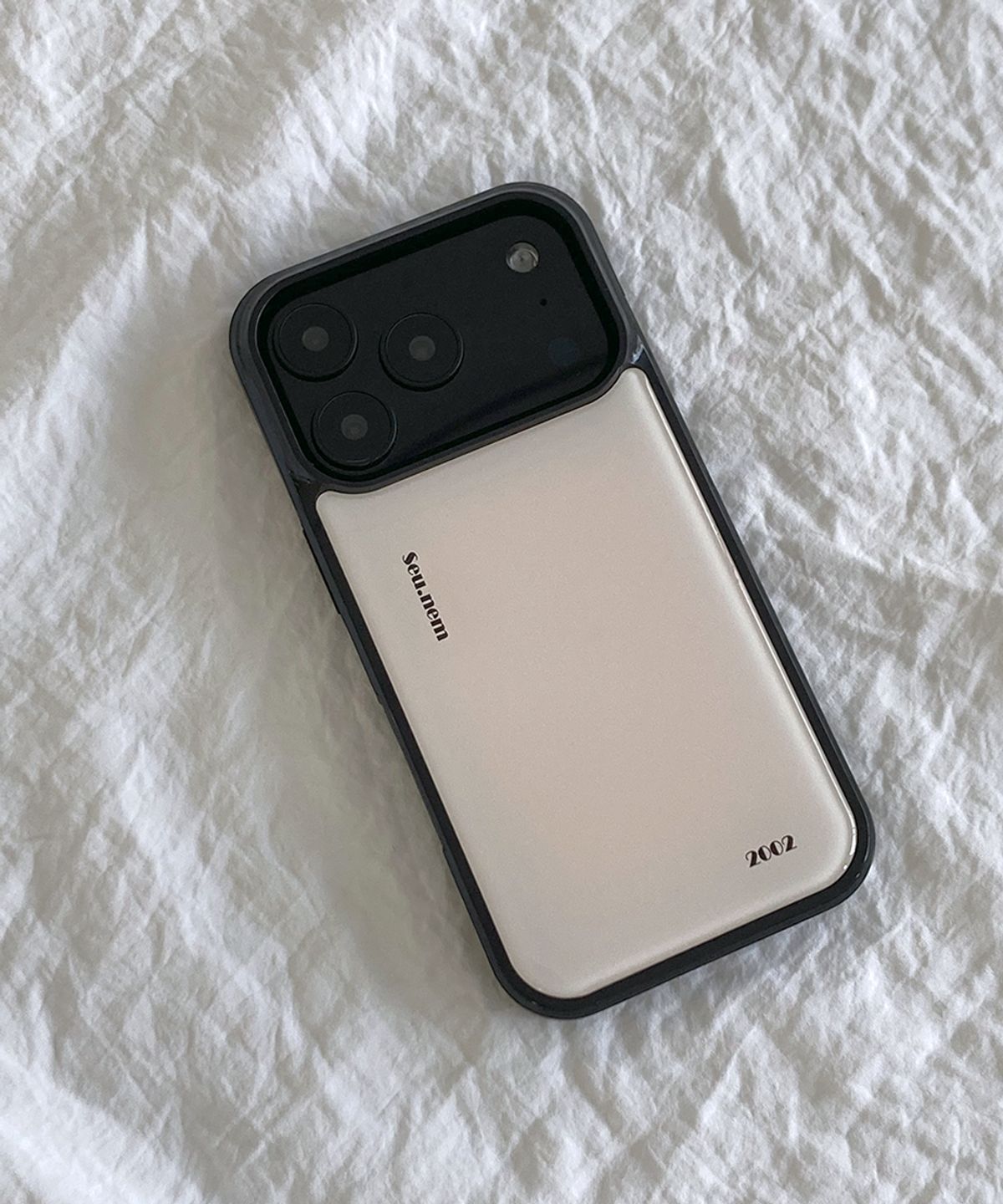 세컨드유니크네임(SECOND UNIQUE NAME) SUN CASE GRAPHIC MIST IVORY