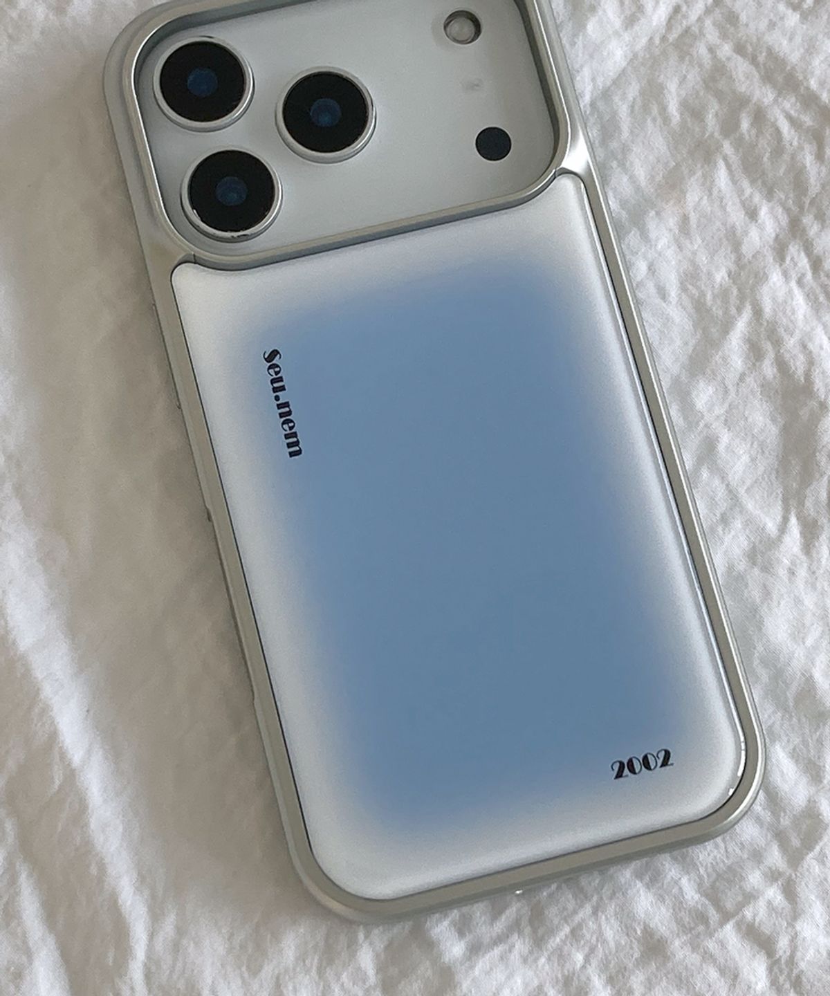 세컨드유니크네임(SECOND UNIQUE NAME) SUN CASE GRAPHIC MIST SKY