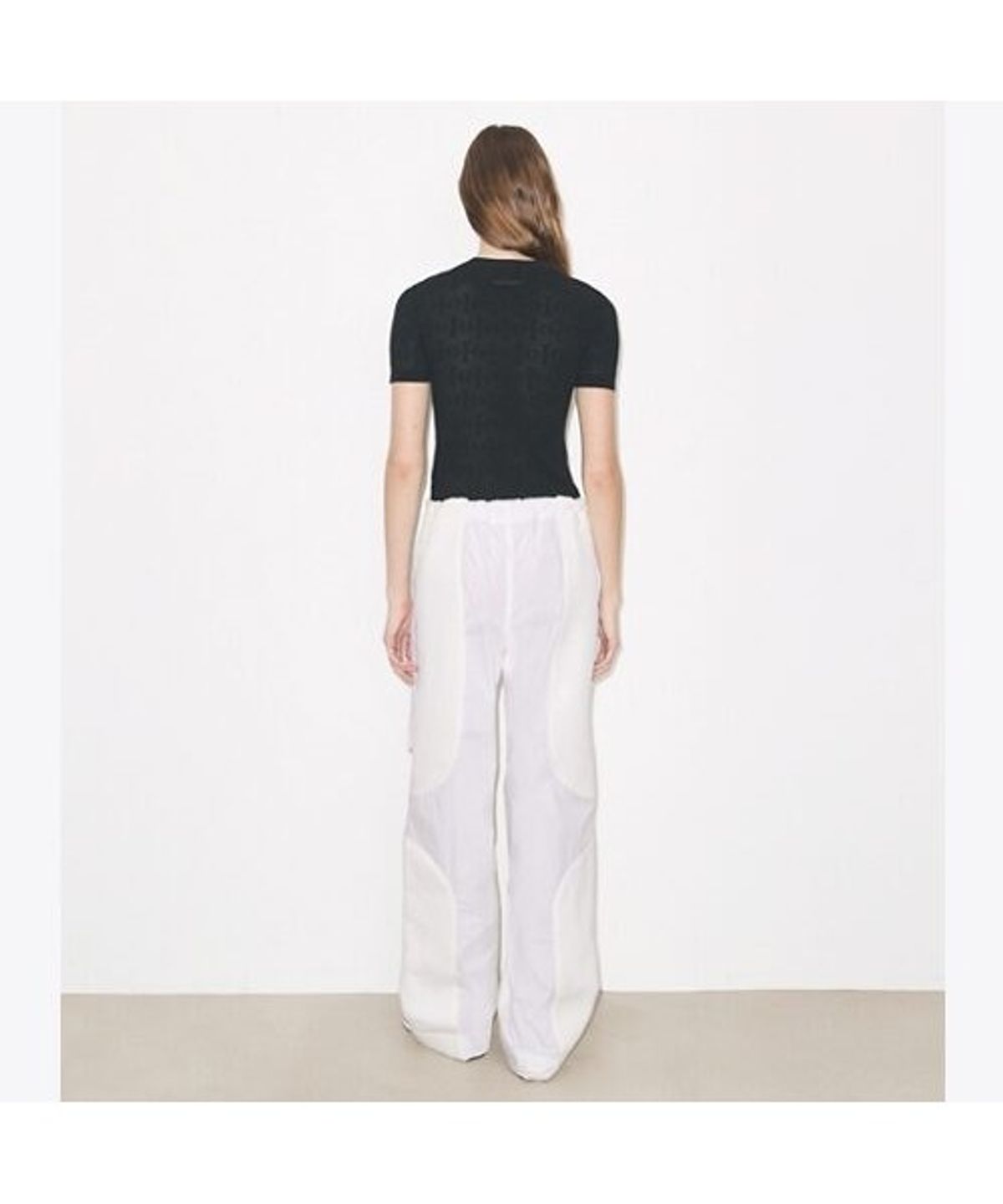 토리버치(TORYBURCH) 티 모노그램 자카드 스웨터 - 블랙
