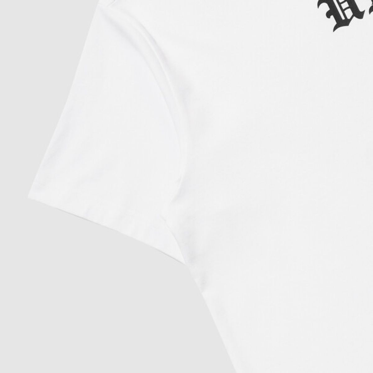 엄브로(UMBRO) 90 타이포 맥스핏 그래픽 반팔 티셔츠 화이트 UR321CRS75