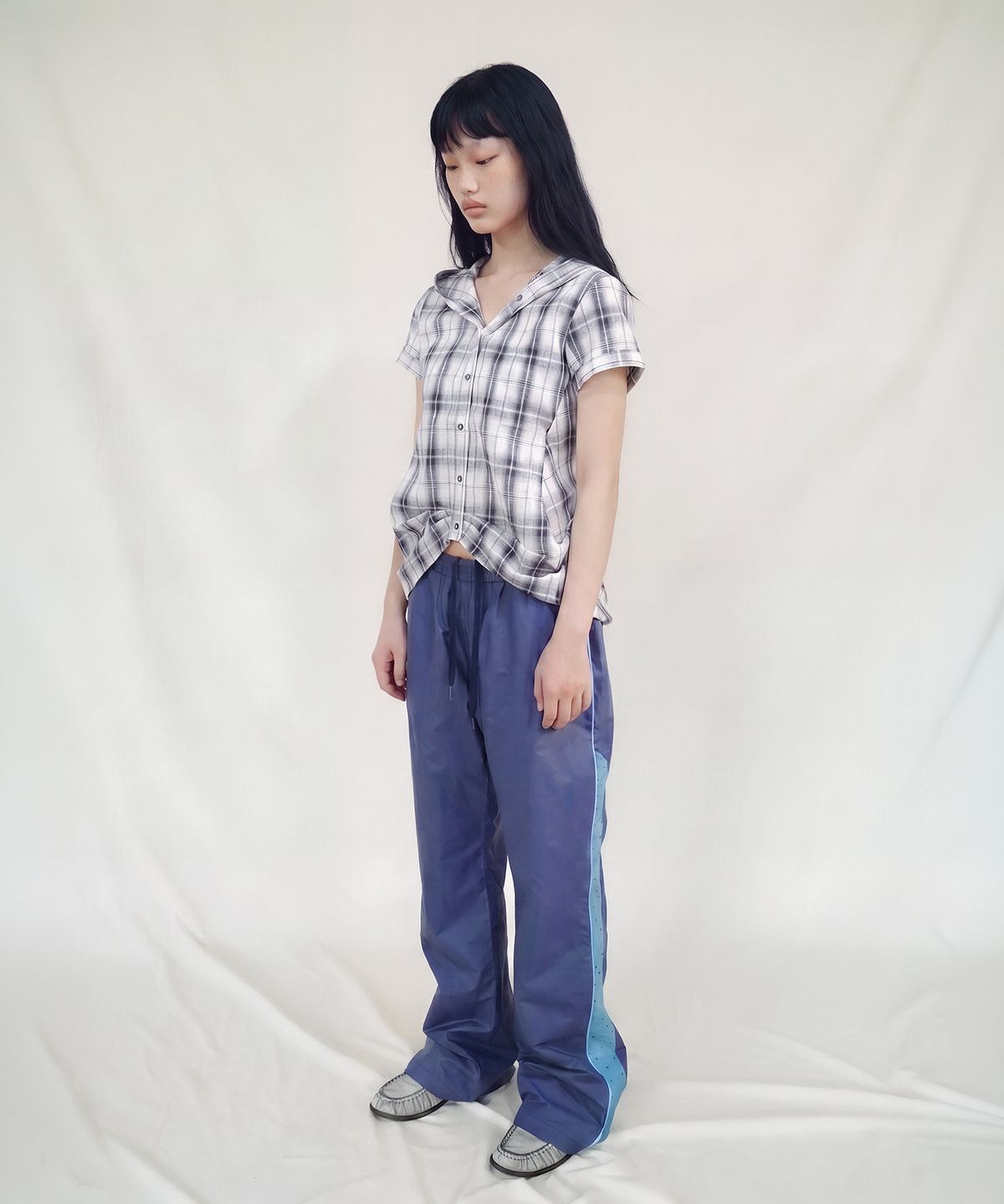 솜속(SOMSOC) LAURA DOT PIPING TRACK PANTS_NAVY