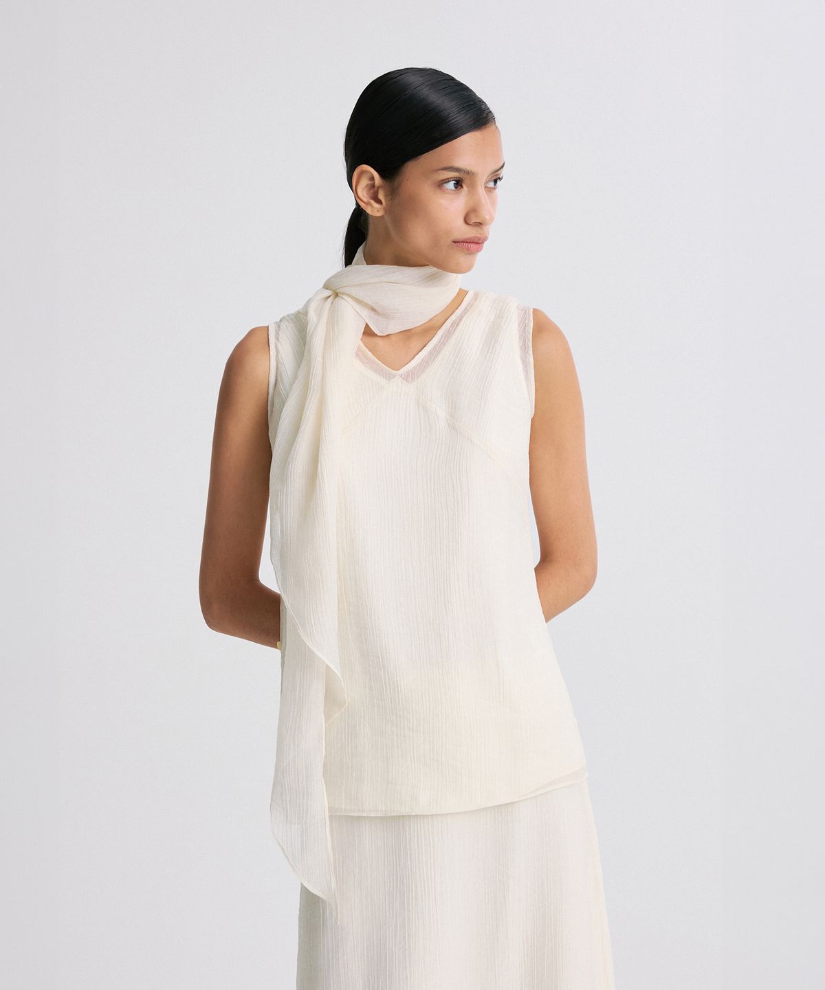 리이(RE RHEE) LAYERED DETAIL SHEER SLEEVELESS TOP PEARL