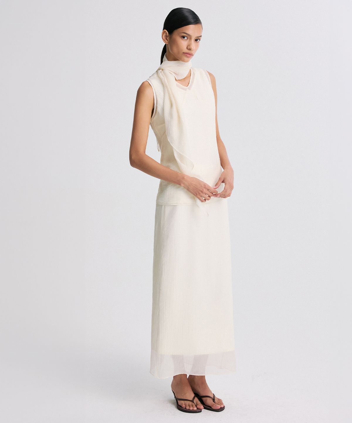리이(RE RHEE) LAYERED DETAIL SHEER SLEEVELESS TOP PEARL