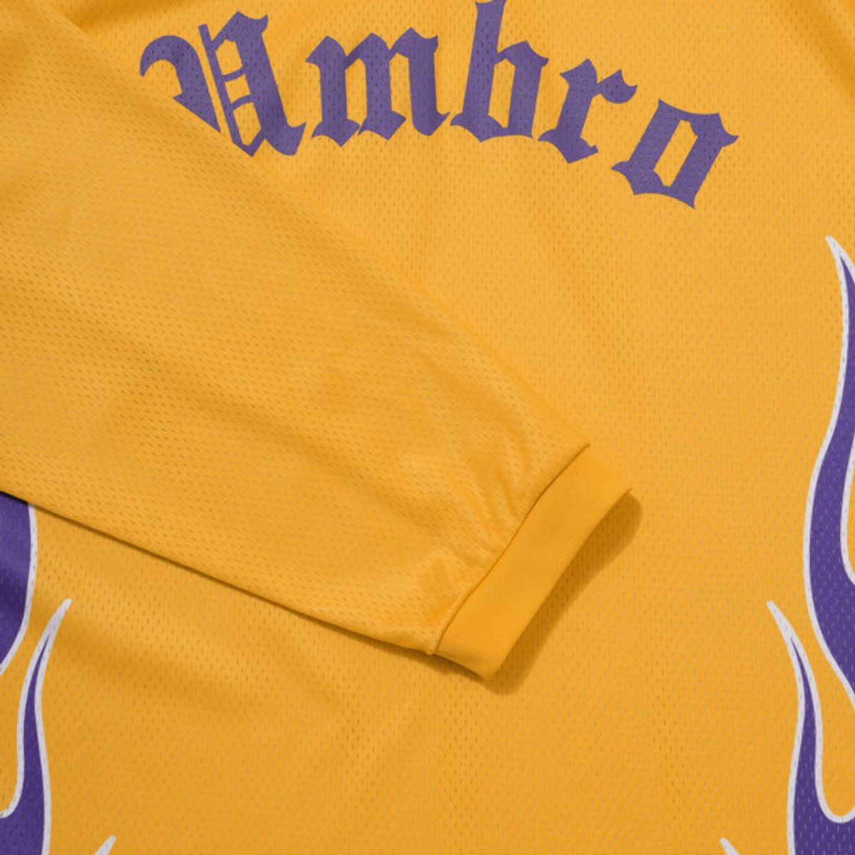 엄브로(UMBRO) 챈트 메쉬 플레임 긴팔 티셔츠 옐로우 UR321CRL72