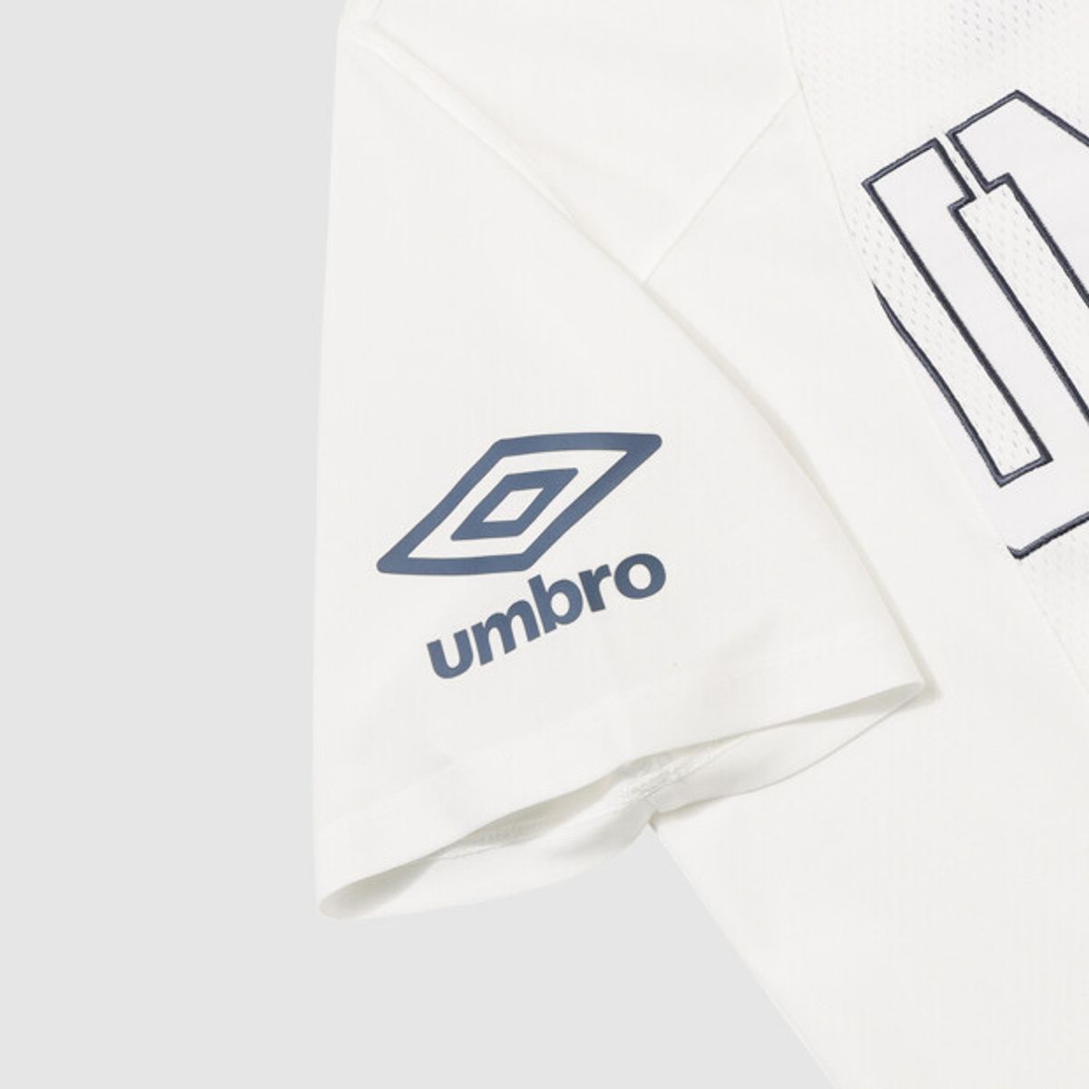 엄브로(UMBRO) 챈트 메쉬 우먼스 그래픽 반팔 티셔츠 아이보리 UR322CRS74