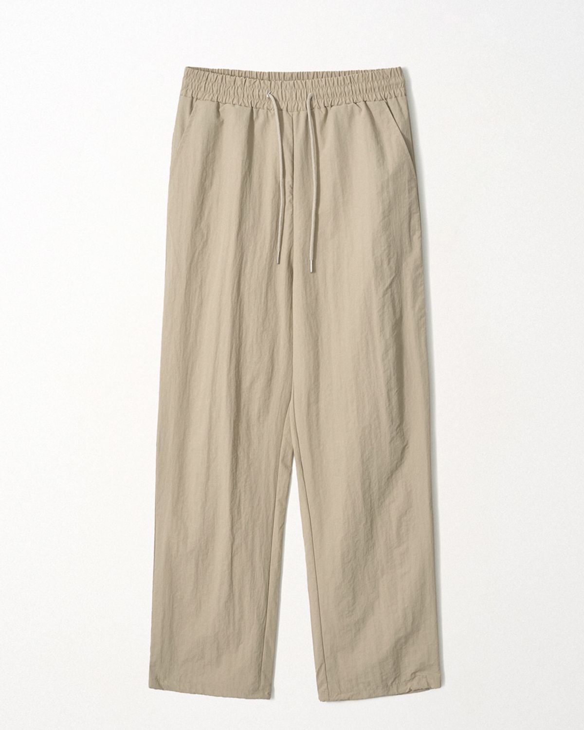 이지오(EZIO) Relaxed Nylon Trousers_Beige