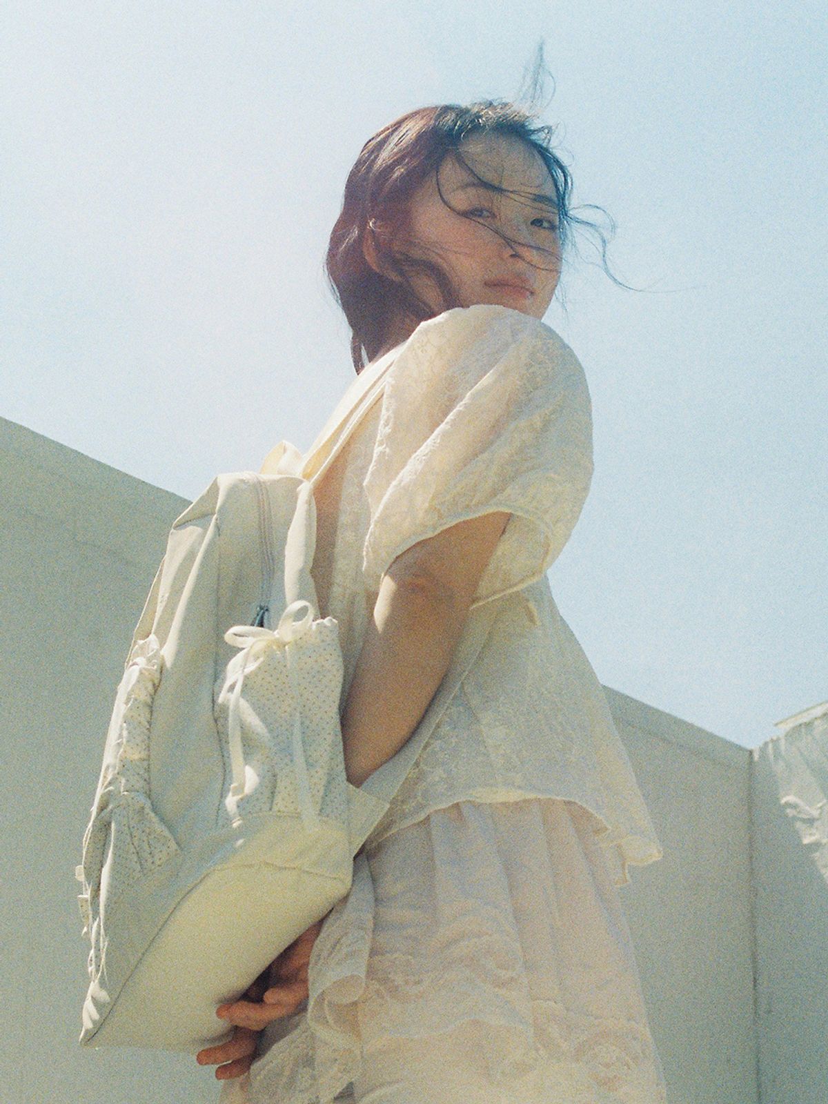 오부니(OVUNI) 러플 리본 백팩_폴카닷 아이보리