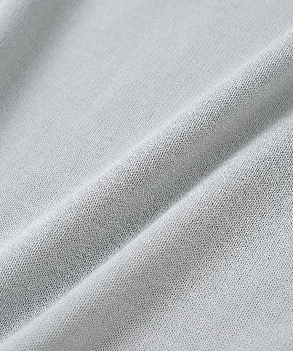 니티드(KNITTED) 쉘론 냉감 싱글 크롭 헨리넥 니트 LIGTH GREY