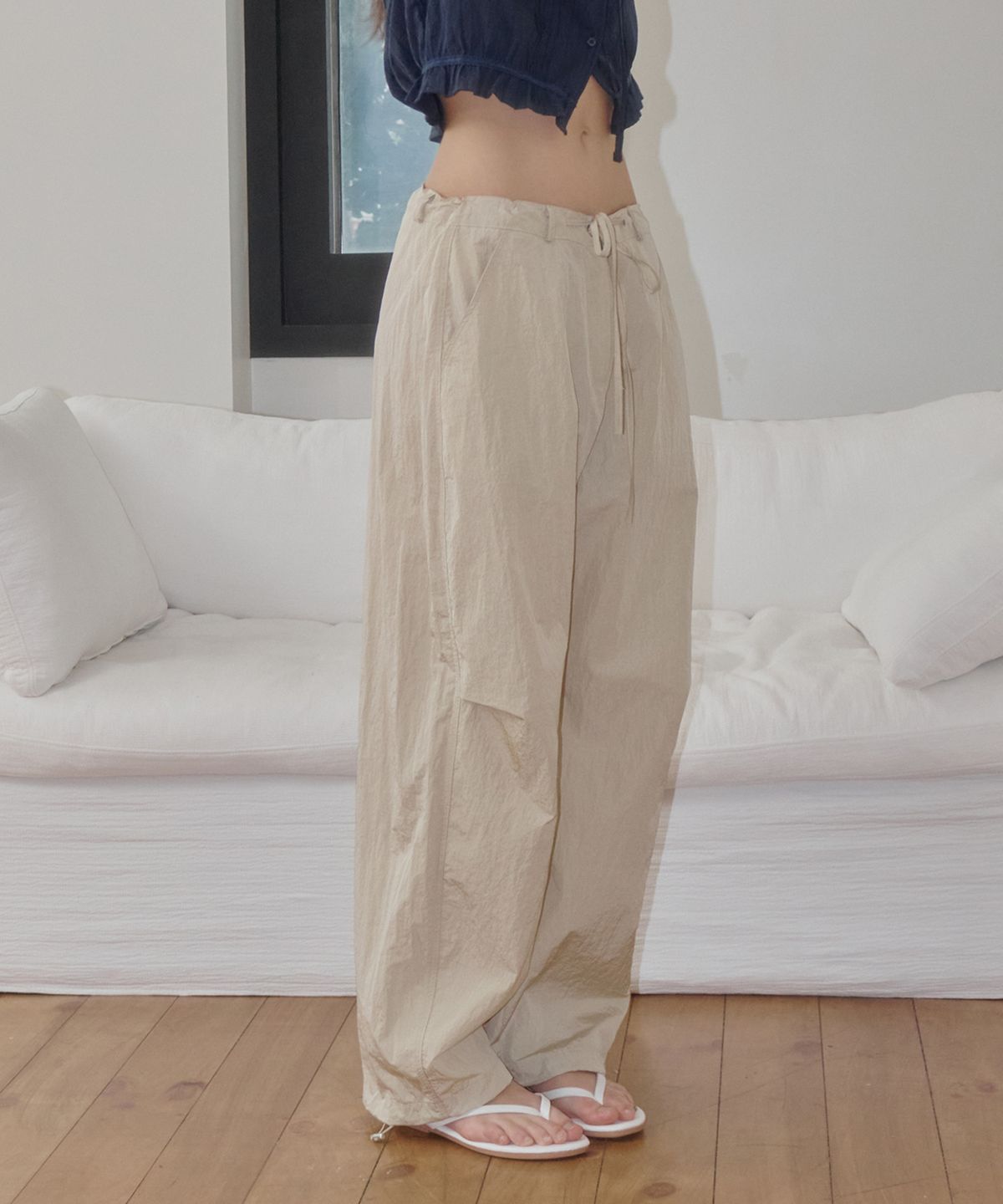 로시로우(LOSSYROW) Grid Nylon Track Pants Beige