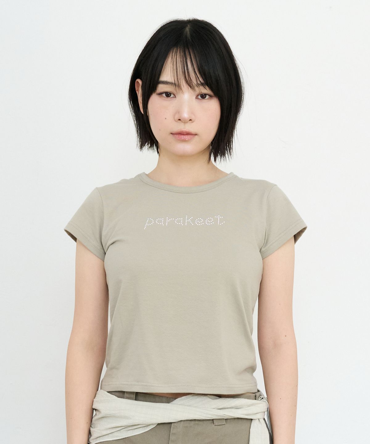패러킷(PARAKEET) 글린트 레터링 티 (샌드 베이지)
