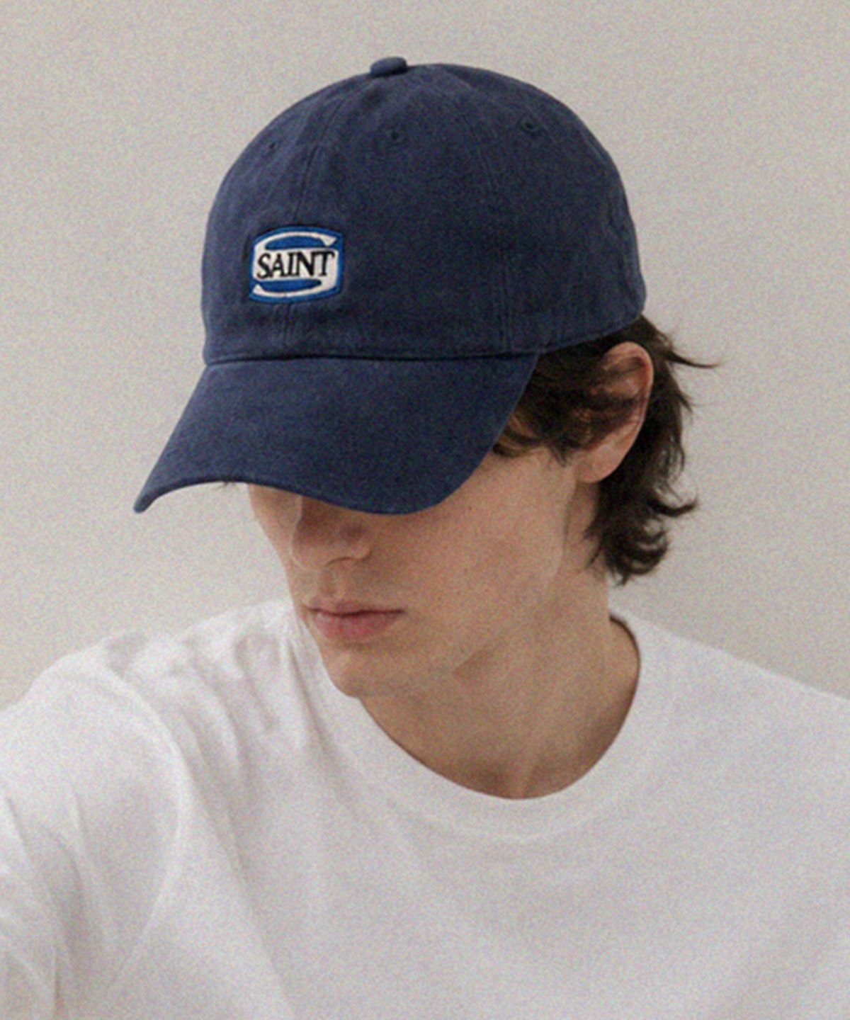 윅(WICK) SAINT 블록 로고 코튼 피치 볼캡-네이비