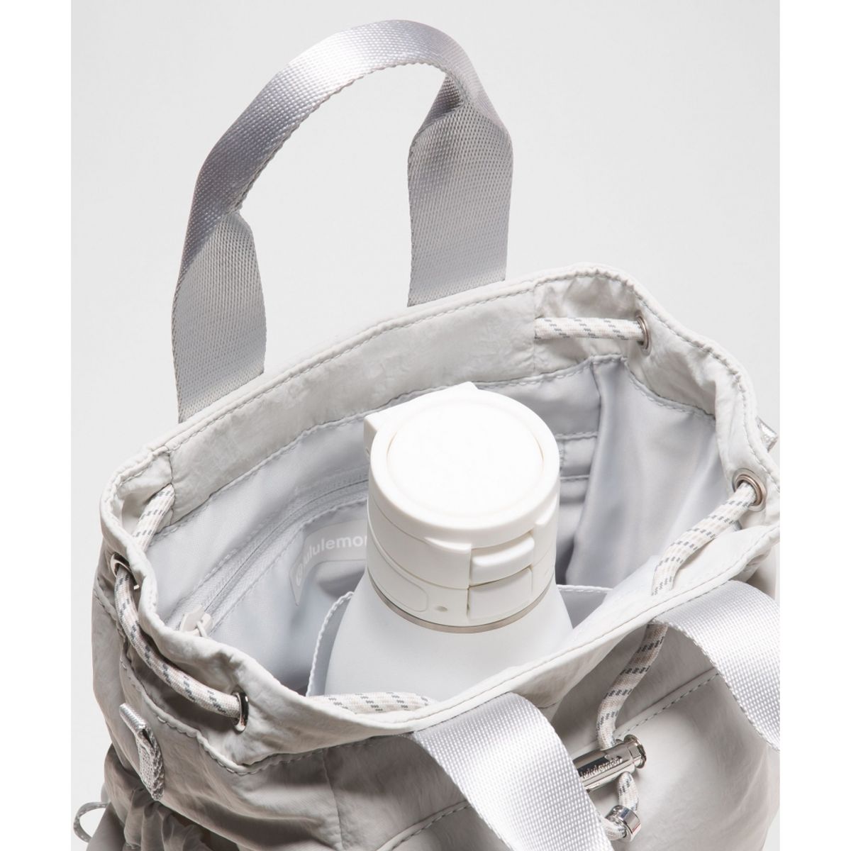 룰루레몬(LULULEMON) 컨버터블 드로스트링 버킷백 미니 5L  VPOR DOWN SLVR