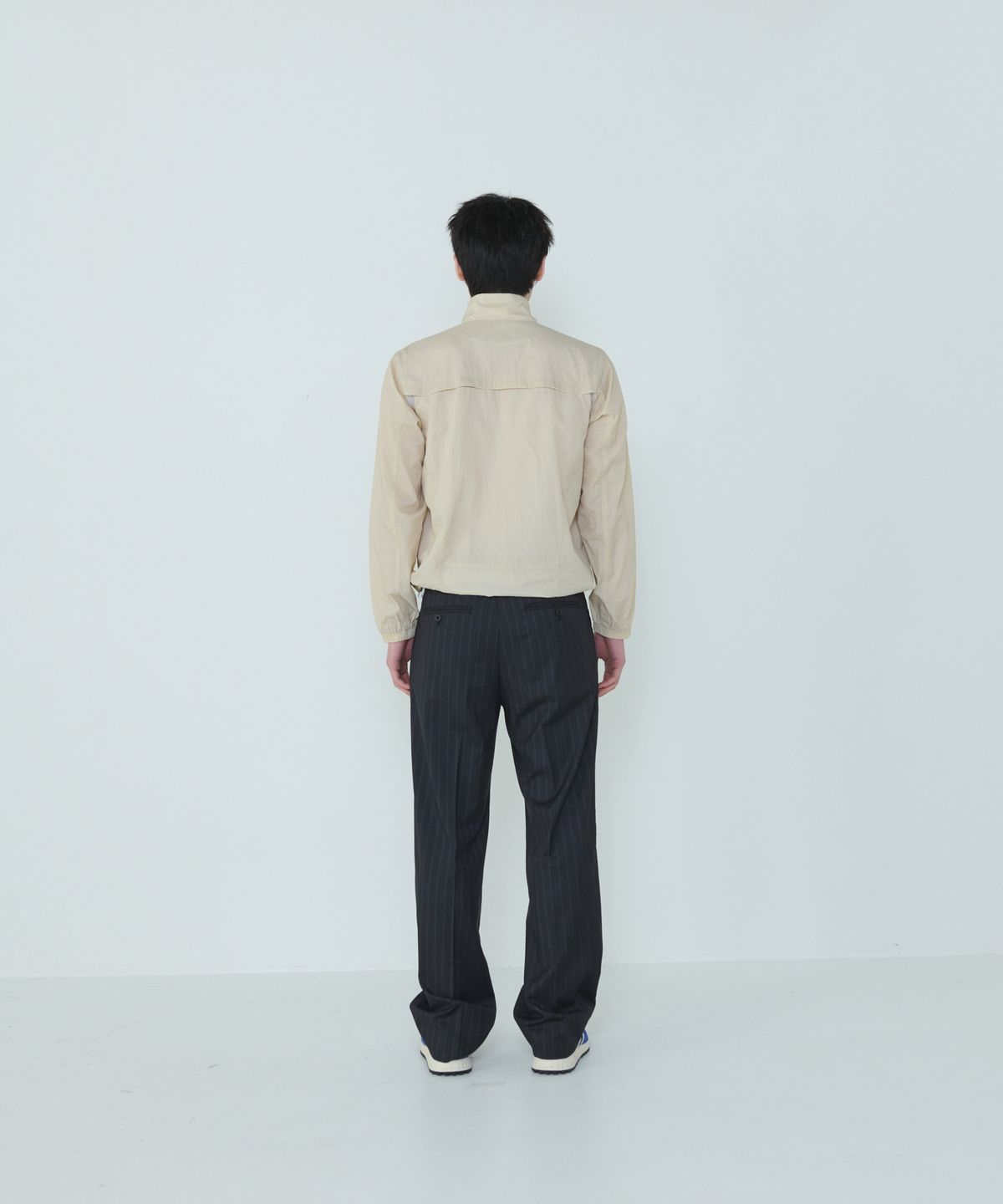 더씽인데어데어(THE THING IN THEIR THERE) Adaptive Nylon Jacket Sand