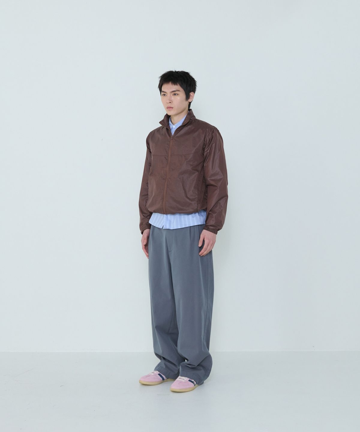 더씽인데어데어(THE THING IN THEIR THERE) Adaptive Nylon Jacket Brownie
