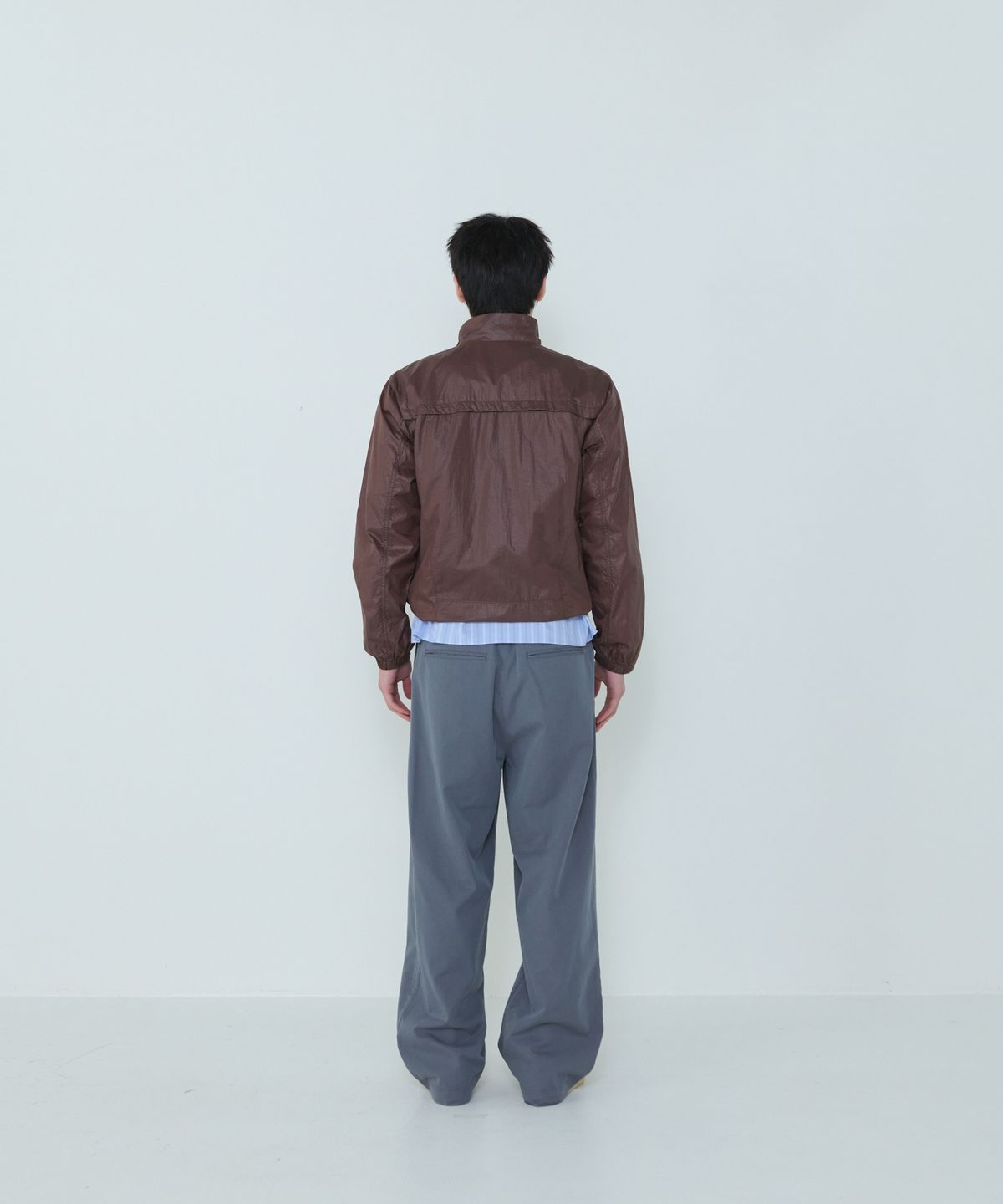 더씽인데어데어(THE THING IN THEIR THERE) Adaptive Nylon Jacket Brownie