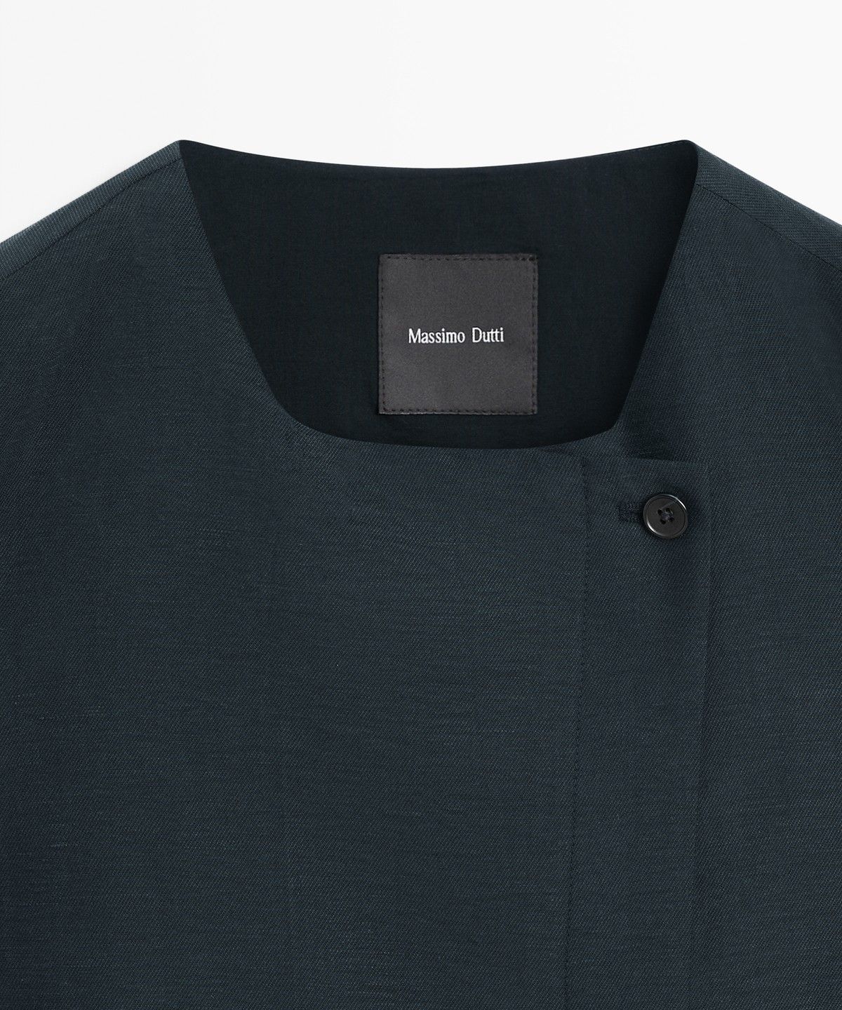 마시모두띠(MASSIMO DUTTI) 비대칭 버튼 린넨 베스트