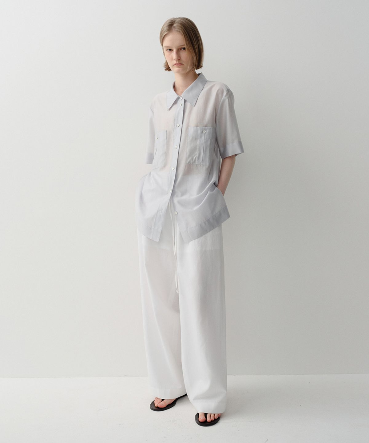 이아(EAAH) LUSE SHEER POCKET SHIRT (PALE BLUE)