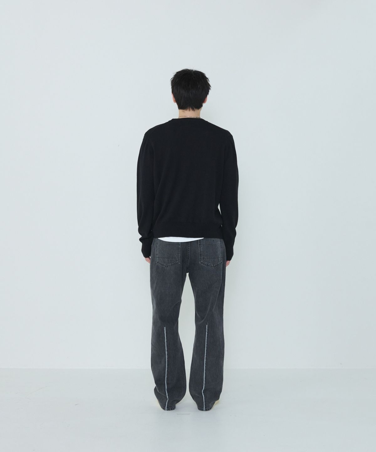 더씽인데어데어(THE THING IN THEIR THERE) Composed Slit Knit Black