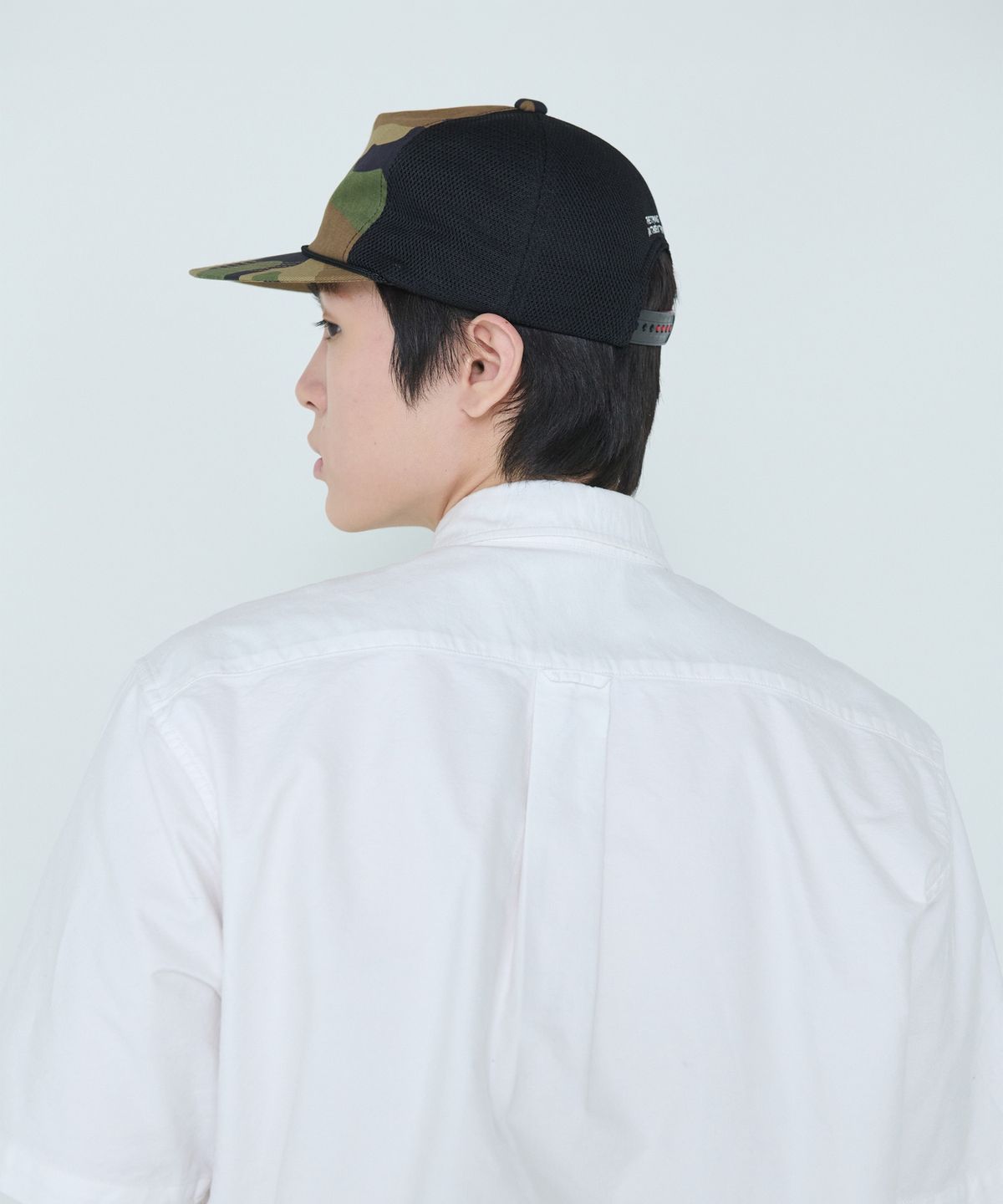 더씽인데어데어(THE THING IN THEIR THERE) Camo Rope Trucker Cap