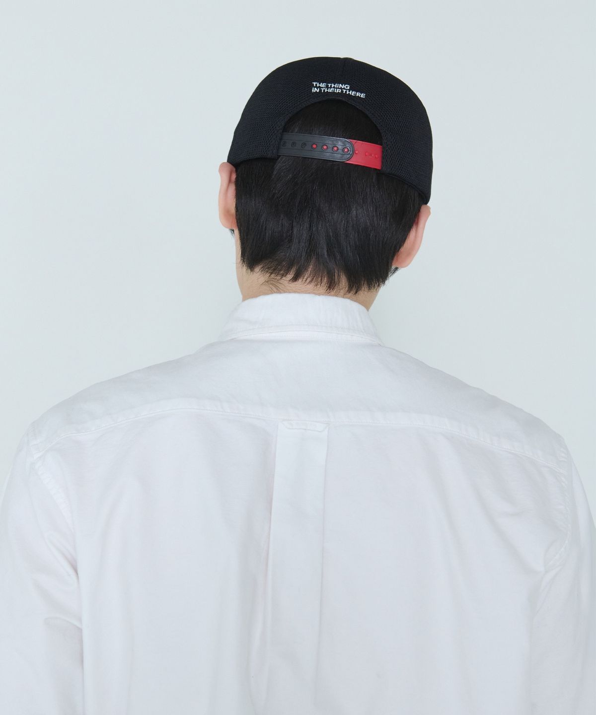 더씽인데어데어(THE THING IN THEIR THERE) Camo Rope Trucker Cap