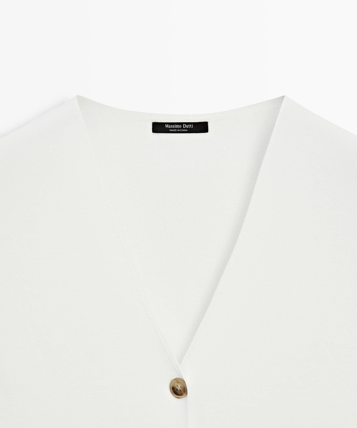 마시모두띠(MASSIMO DUTTI) 버튼 디테일 니트 베스트