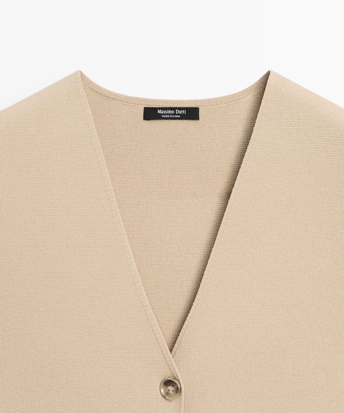 마시모두띠(MASSIMO DUTTI) 버튼 디테일 니트 베스트