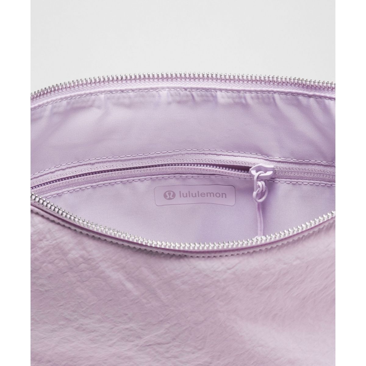 룰루레몬(LULULEMON) 컨버터블 루시드 크로스바디 백 6.5L  LLAY LOTU SLVR