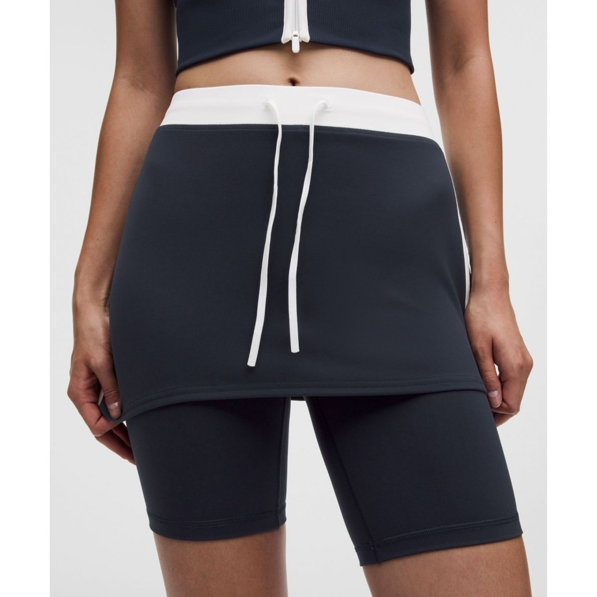 룰루레몬(LULULEMON) Everlux™ 컬러블록 레이어드 스커트  TRNV WHT