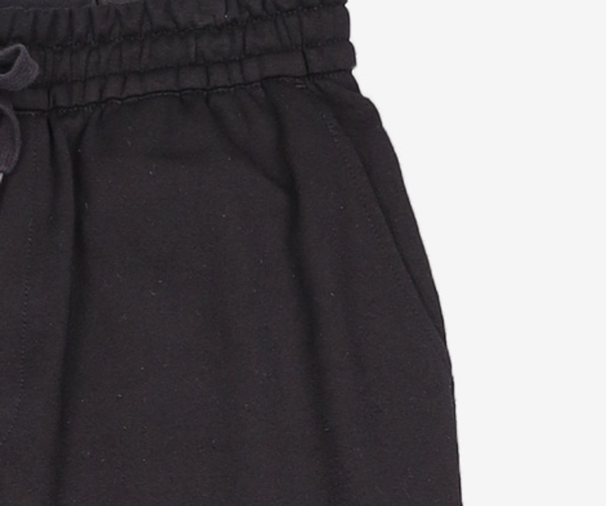 언코티드247(UNCOATED 247) 트레이닝 팬츠 M