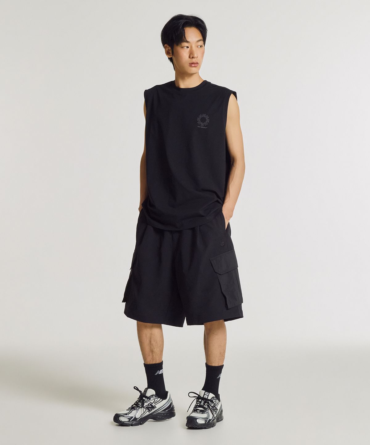 뉴발란스(NEW BALANCE) NBNVG31703 / UNI 트랙스터 6부 카고 쇼츠 (BLACK)