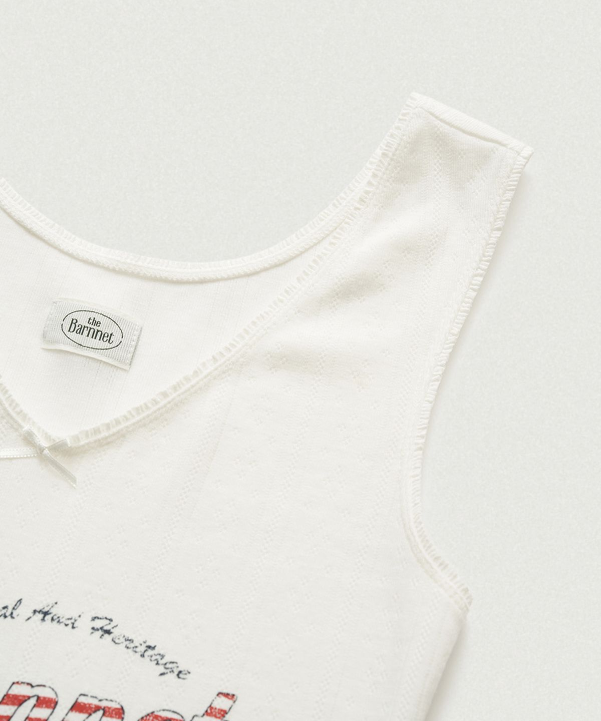더바넷(THEBARNNET) Lois Ribbed Logo Tank Top_White