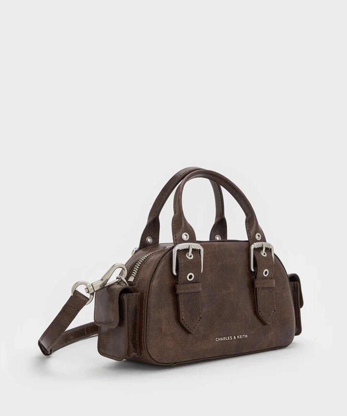 찰스앤키스(CHARLES & KEITH) 블레이즈 버클 스트랩 사이드 포켓 볼링백 2colors CK2-30770735