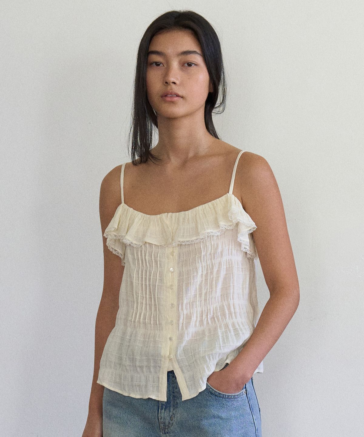 망고매니플리즈(MANGO MANY PLEASE) DASHA FRILL SLEEVELESS_CREAMY YELLOW